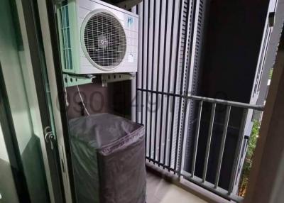Compact balcony with air conditioning units and protective cover