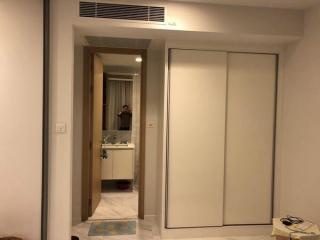 Bedroom with sliding closet doors and en-suite bathroom entrance