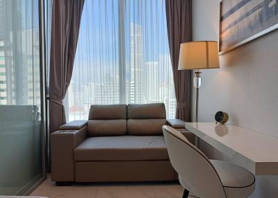 Modern living room with city view and abundant natural light