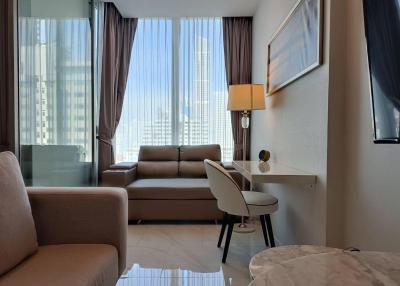 Modern living room with city view through large windows