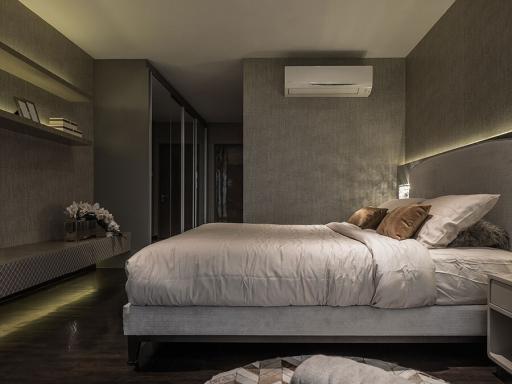 Modern cozy bedroom with dim lighting and elegant decor