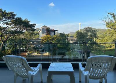 Spacious balcony with scenic view and outdoor seating