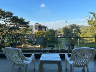 Spacious balcony with scenic view and outdoor seating