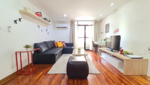 Cozy and well-lit living room with modern furnishings