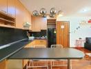 Modern kitchen with integrated dining area and ample cabinet space