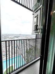 High-rise apartment balcony with city view