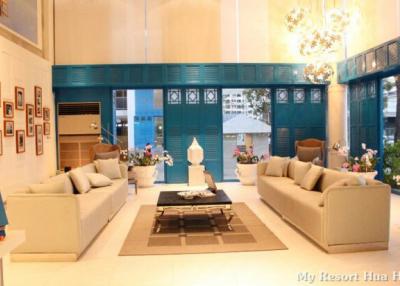 Spacious living room with modern decor and ample seating