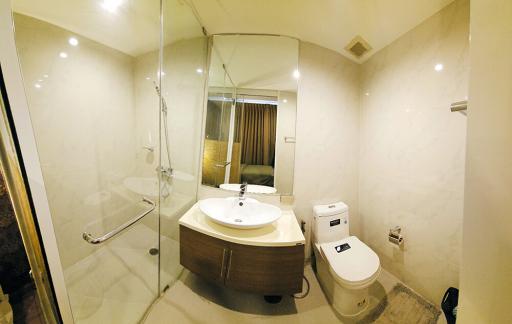 Modern bathroom interior with glass shower enclosure