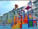 Colorful children's playground with water features in an apartment complex