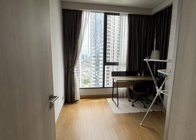 Compact bedroom with city view