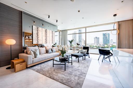 Spacious and well-lit modern living room with city view