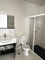 Compact bathroom with modern amenities