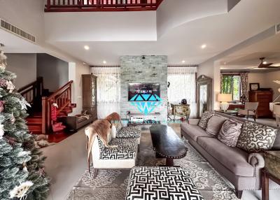 Spacious living room with modern furniture and natural lighting