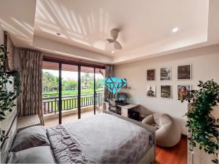 Cozy bedroom with modern design and balcony access