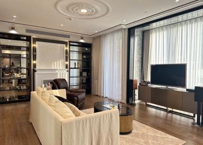 Elegant living room with modern furnishings and abundant natural light