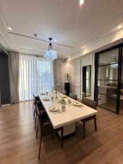 Stylish dining room with a large table and modern decor