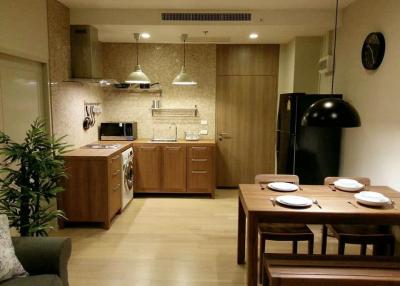 Modern kitchen with dining area in a cozy apartment