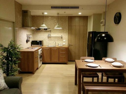 Modern kitchen with dining area in a cozy apartment