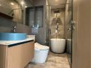 Modern bathroom with glass shower and contemporary fixtures