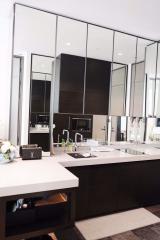 Modern kitchen with large mirrors and sleek design