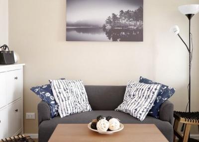 Cozy living room with modern furniture and wall art