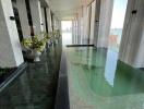 Luxury building indoor pool area with ocean view