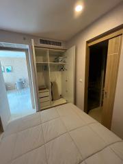 Compact bedroom with built-in closet and access to ensuite bathroom