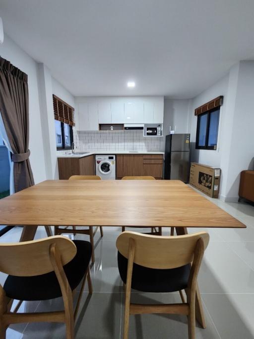 Modern kitchen with dining area and open floor plan