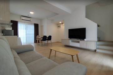 Spacious and modern living room with natural light