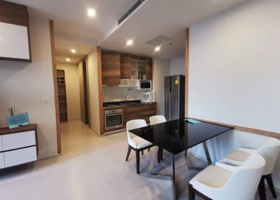 Modern kitchen with adjacent dining area in an open floor plan