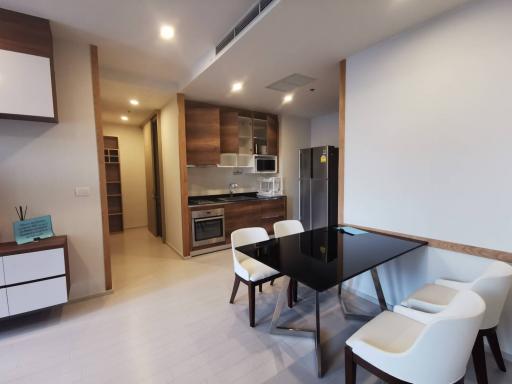 Modern kitchen with adjacent dining area in an open floor plan