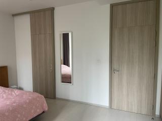 Spacious Bedroom with Large Wardrobe and Ample Natural Light