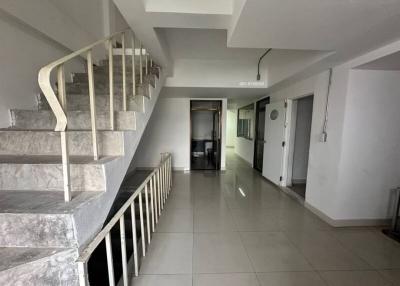 Interior view showing staircase and hallway in a modern home