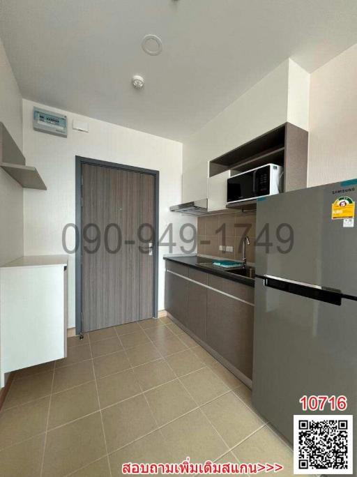 Modern kitchen with stainless steel appliances and ample cabinet space