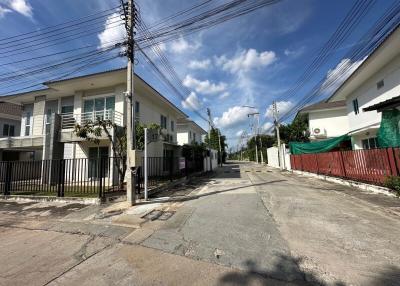 Suburban road with row of houses