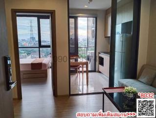 Cozy bedroom with city view, integrated living space, and natural light