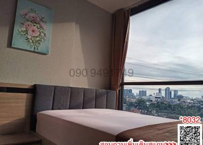 Cozy bedroom with a city view
