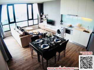 Modern living room with dining area and connected open kitchen, large windows with city view