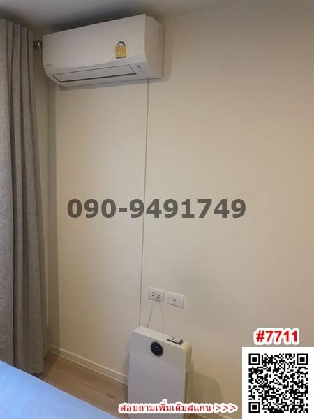 Compact Bedroom with Air Conditioning Unit