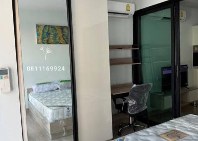 Cozy and furnished bedroom with mirrored wardrobe and en-suite bathroom
