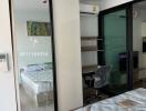 Cozy and furnished bedroom with mirrored wardrobe and en-suite bathroom