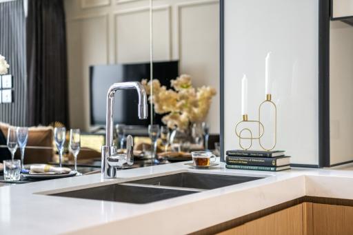 Modern kitchen countertop with stylish faucet and sink