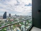 City view from a high-rise balcony with clear skies