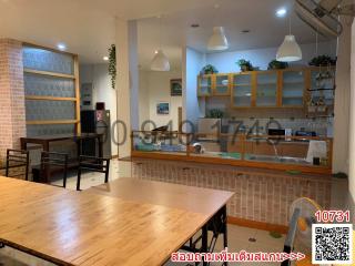 Spacious modern kitchen with dining area and wooden finishes