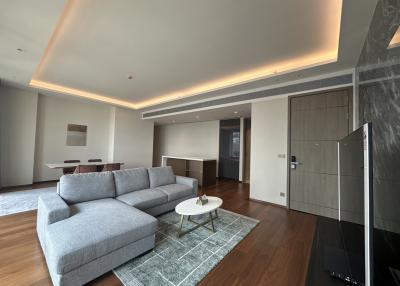 Spacious and modern living room with comfortable seating and natural light