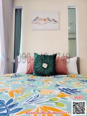 Colorful and cozy bedroom with patterned bedding and decorative pillows