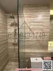 Modern bathroom interior with shower and glass door