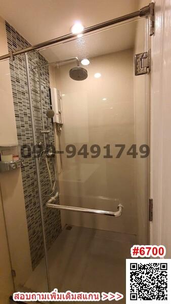 Modern bathroom with glass shower enclosure