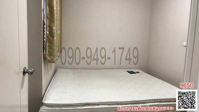 Small unfurnished bedroom with a single mattress on the floor