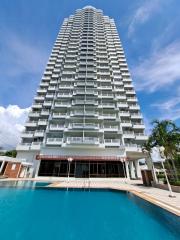 Modern high-rise residential building with pool
